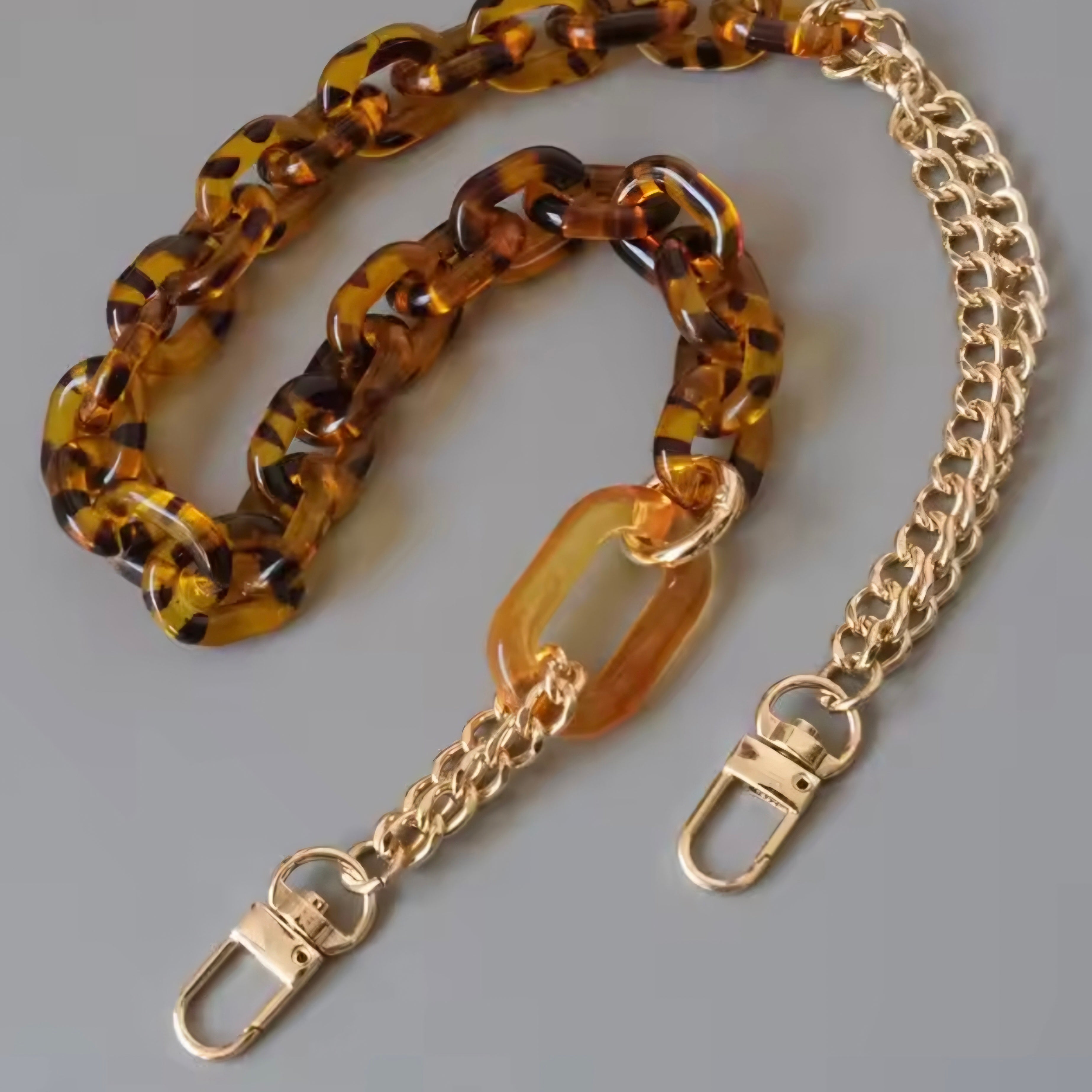 Amber acrylic gold chain bag strap